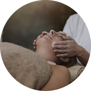 An image of a woman receiving a facial massage.